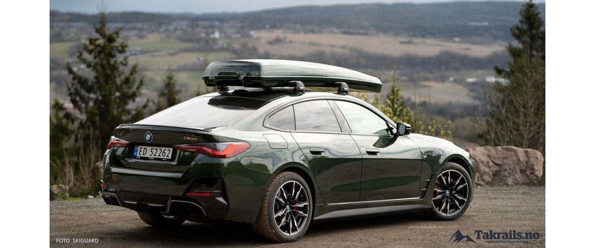 BMW i4 med thule takstativ og Skiguard skiboks